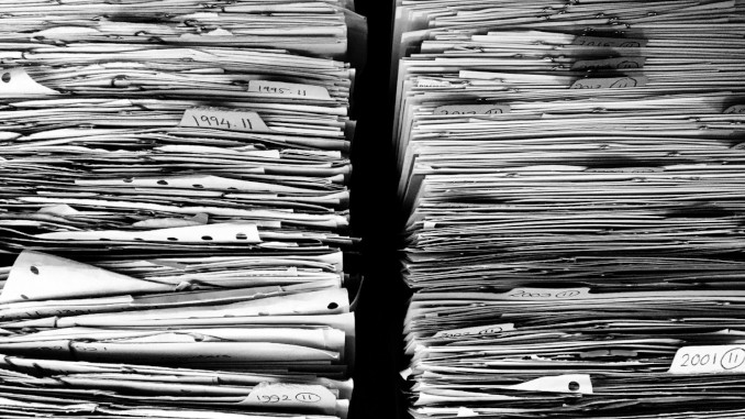 Corey_Files-paper-stack-678x381